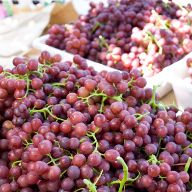 Crates if red grapes