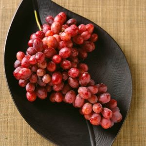 Grapes on a table boat