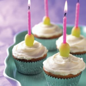 Cup cakes with grapes