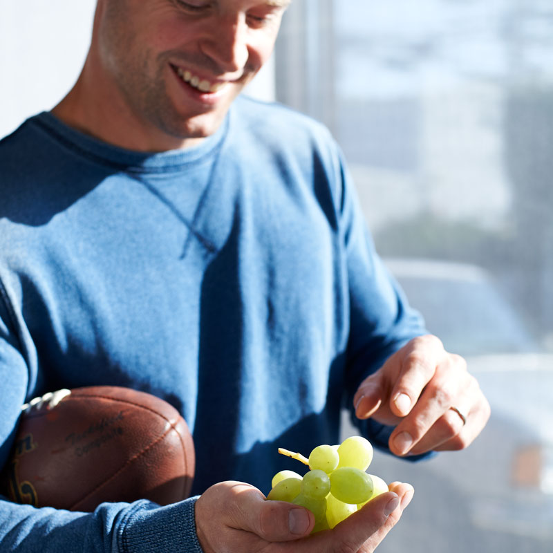 Man with grapes