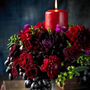 Grapes in red floral arrangment