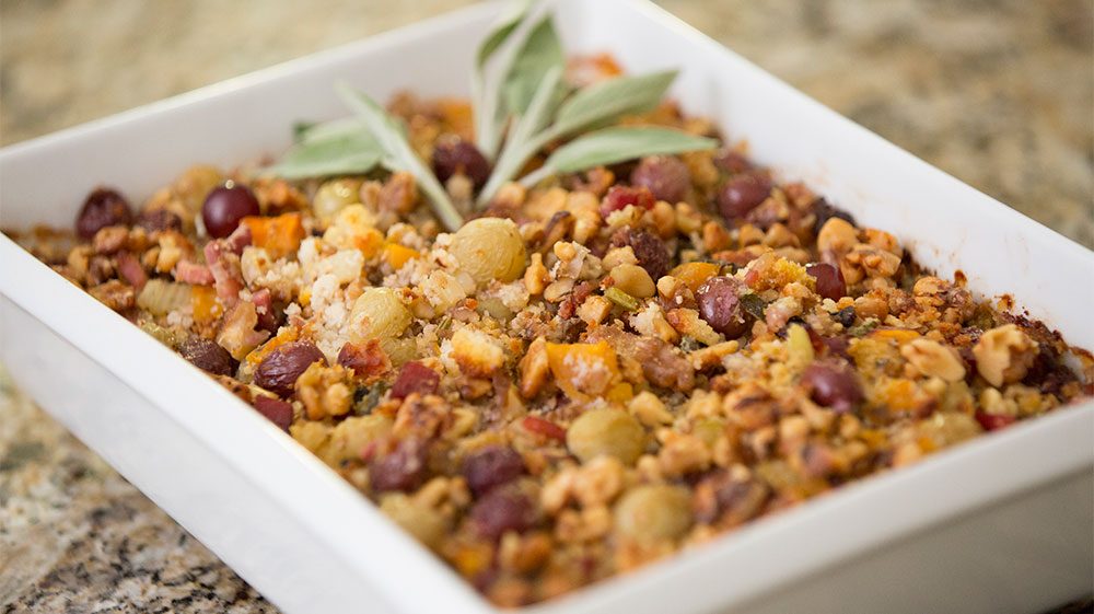 cornbread-dressing-with-roasted-grapes-walnuts-and-pancetta