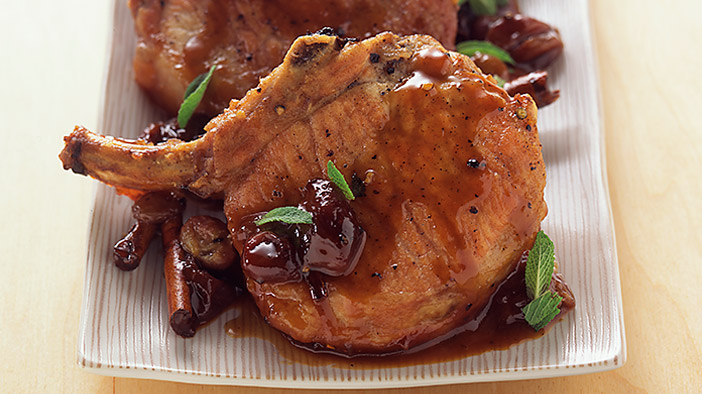 pork-chops-braised-with-spiced-honey-and-grapes